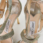Sandalias de tacón Jimmy Choo, en textil dorado.