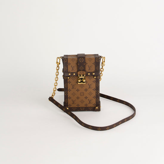 Bolso Crossbody Louis Vuitton Vertical Trunk Pochette en Canvas Monogram