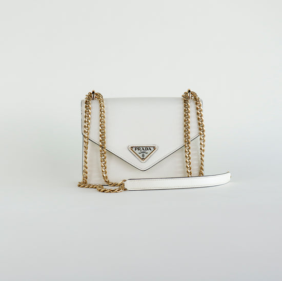 Bolso Crossbody Prada Lux Off en piel Saffiano Beige