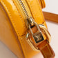 Bolso Crossbody Louis Vuitton Christie en Piel Vernis Amarilla