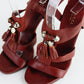Sandalias de Tacón Gucci de Piel Café con Borlas Doradas