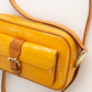 Bolso Crossbody Louis Vuitton Christie en Piel Vernis Amarilla
