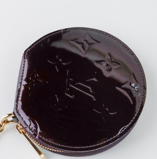 Monedero Circular Louis Vuitton en Piel Vernis Amarante