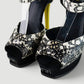 Sandalias de plataforma marca Fendi en piel animal print