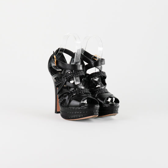 Sandalias de Tacón Prada en Piel Negra con Hebilla Dorada