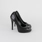 Tacones Tory Burch en Piel Negra con Plataforma