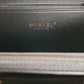 Bolso tipo neceser Chanel en piel negra