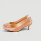Zapatos de tacón bajo Christian Louboutin  de charol nude