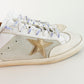 Tenis casuales Golden Goose Super Star en piel blanca.