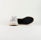 Tenis casuales Golden Goose Super Star en piel blanca.
