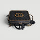 Bolso tipo neceser Chanel en piel negra